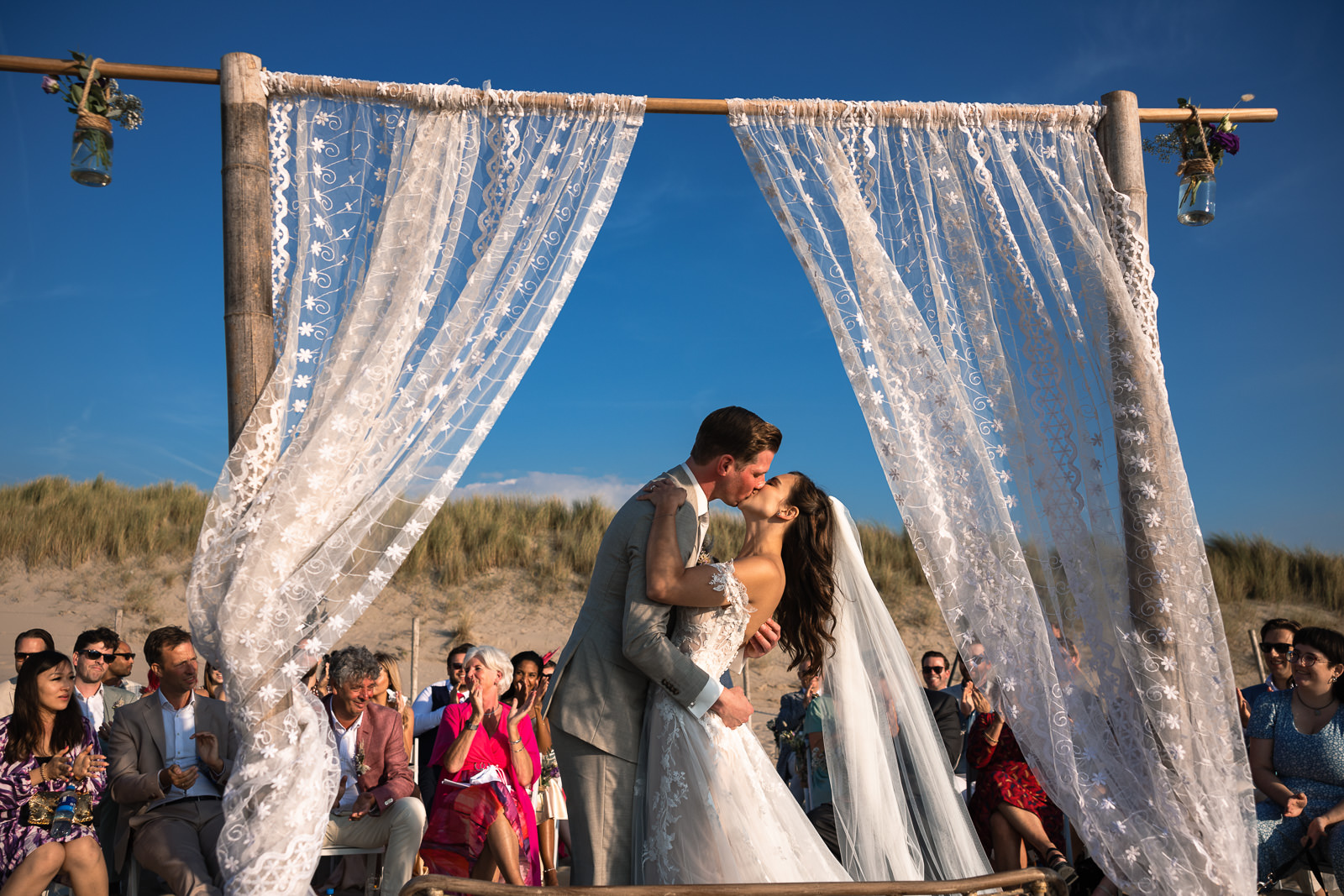 First kiss during Intimate Beach Wedding Photographer