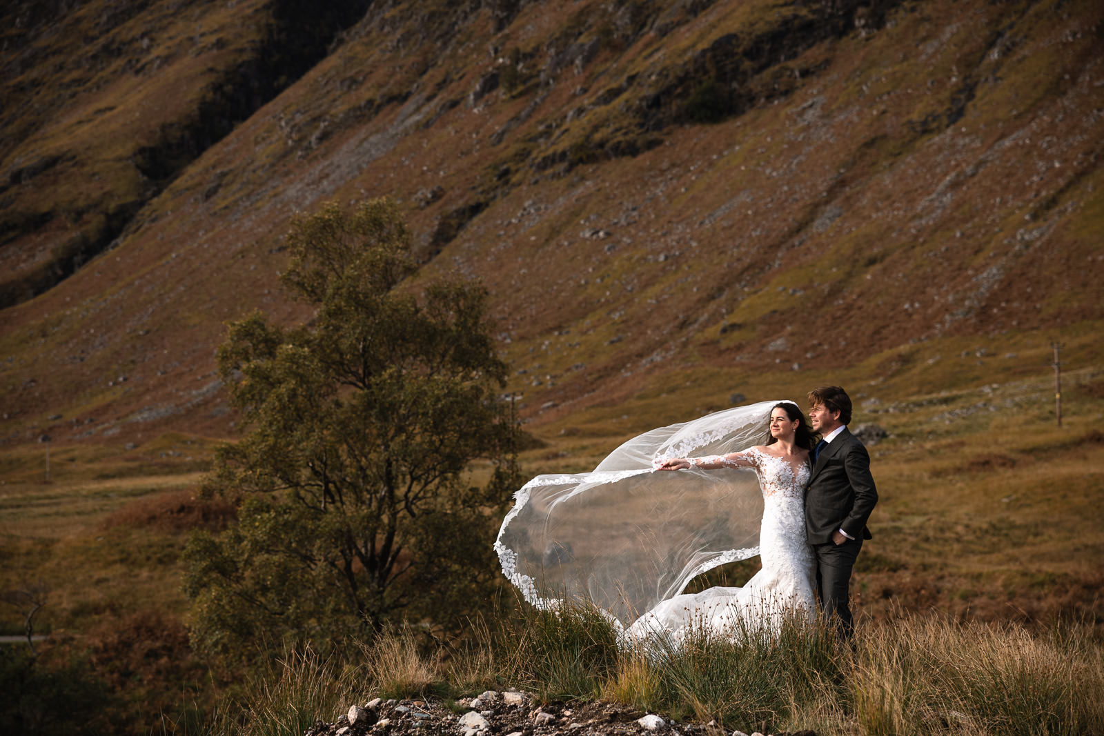 Highlands Wedding Photographer Scotland Brides Vail blowing in the wind