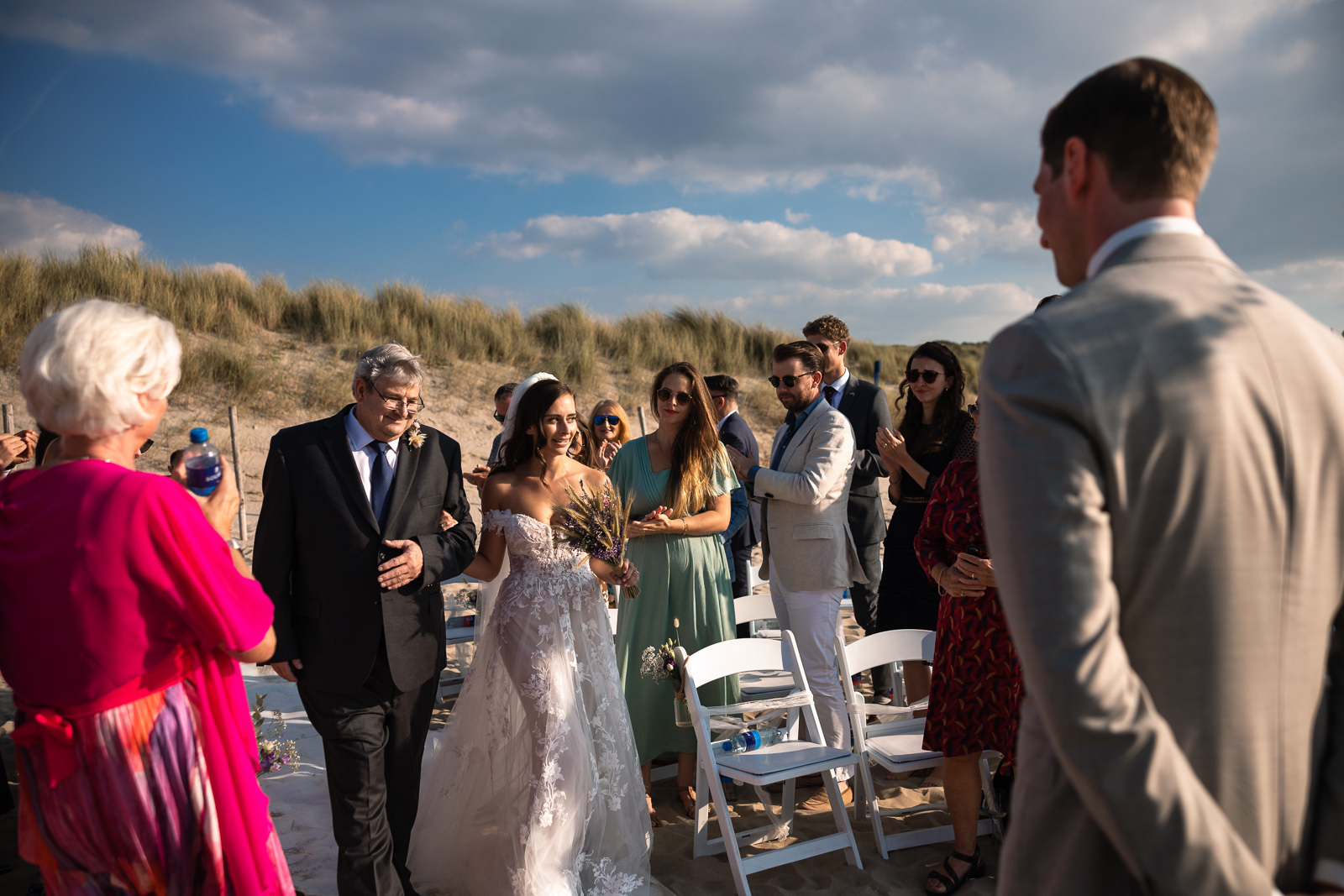 Father walks bride down the isle of Intimate Beach Wedding Photographer