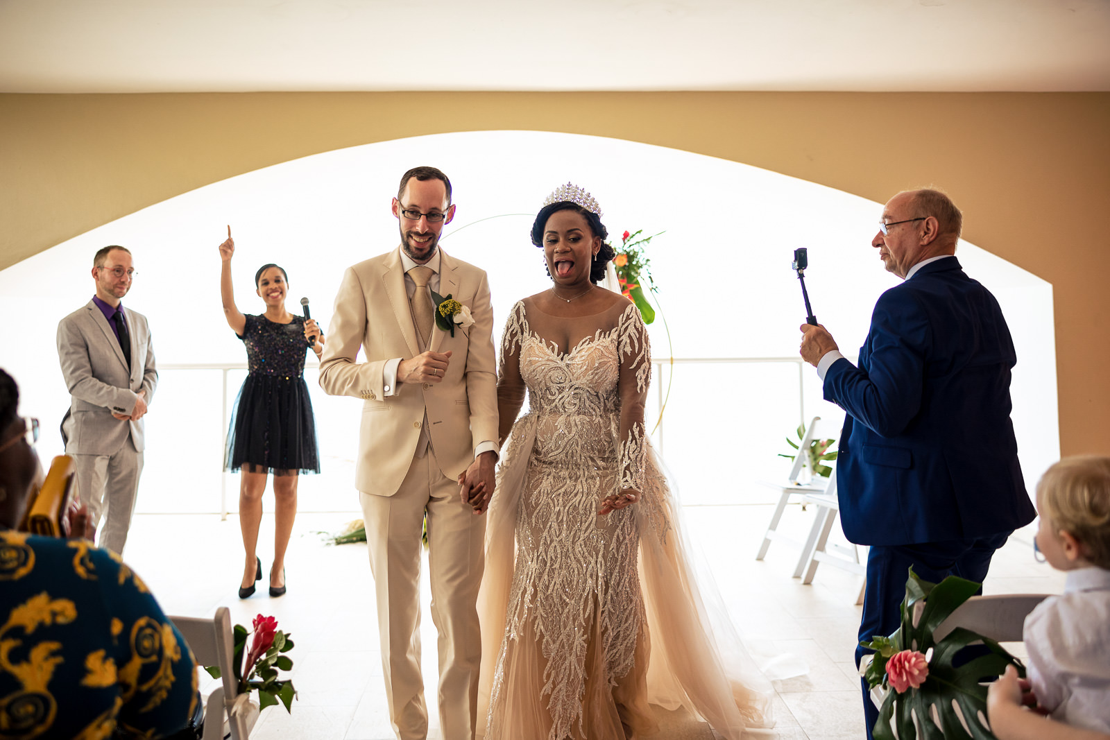 Destination wedding photographer Panama Bride and groom walking down the isle just married