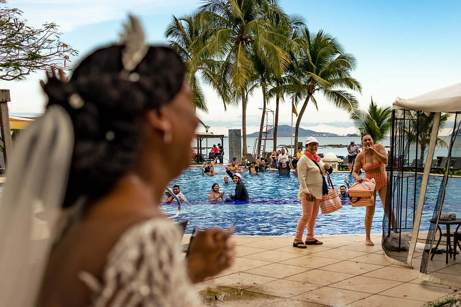 Destination wedding photographer Panama photoshoot with reaction from the guests at the pool