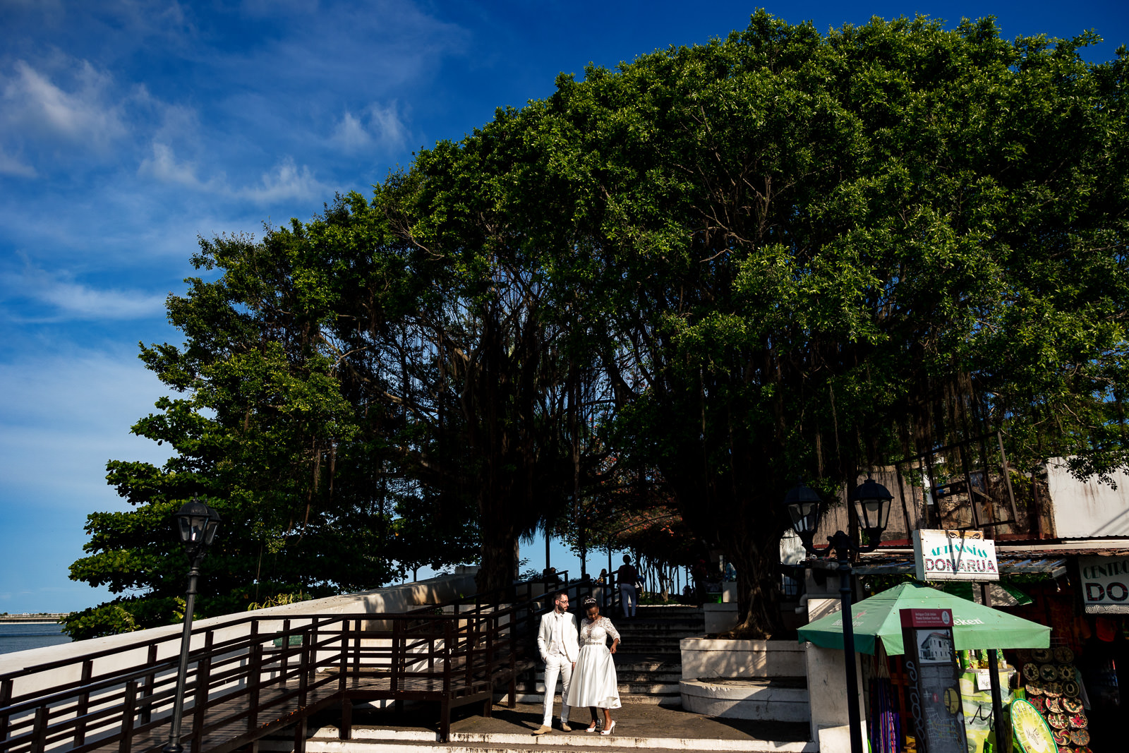 Destination after wedding shoot photographer Panama couple at the top of the stairs