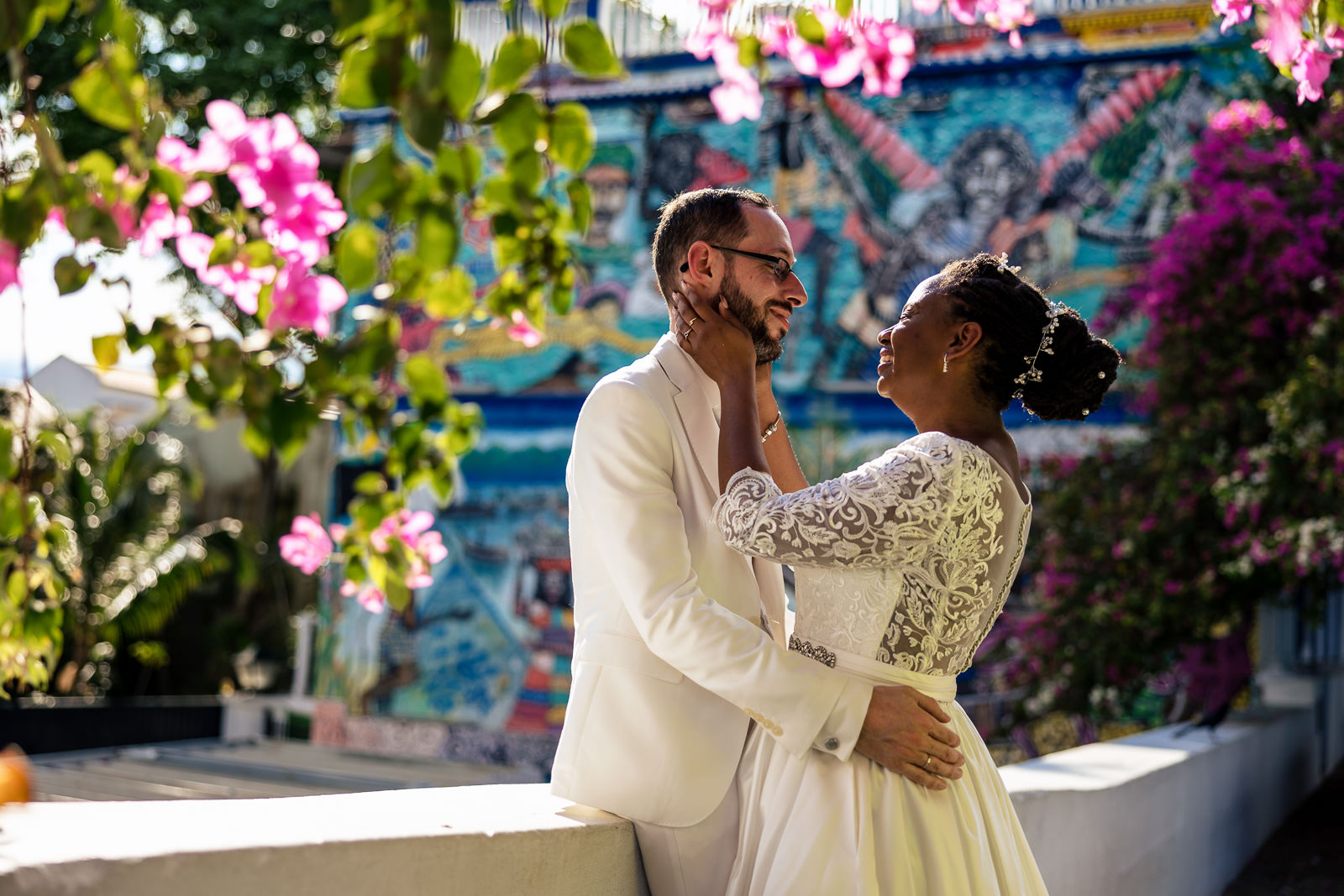 Destination after wedding shoot photographer Panama Couple romantic under flower arch