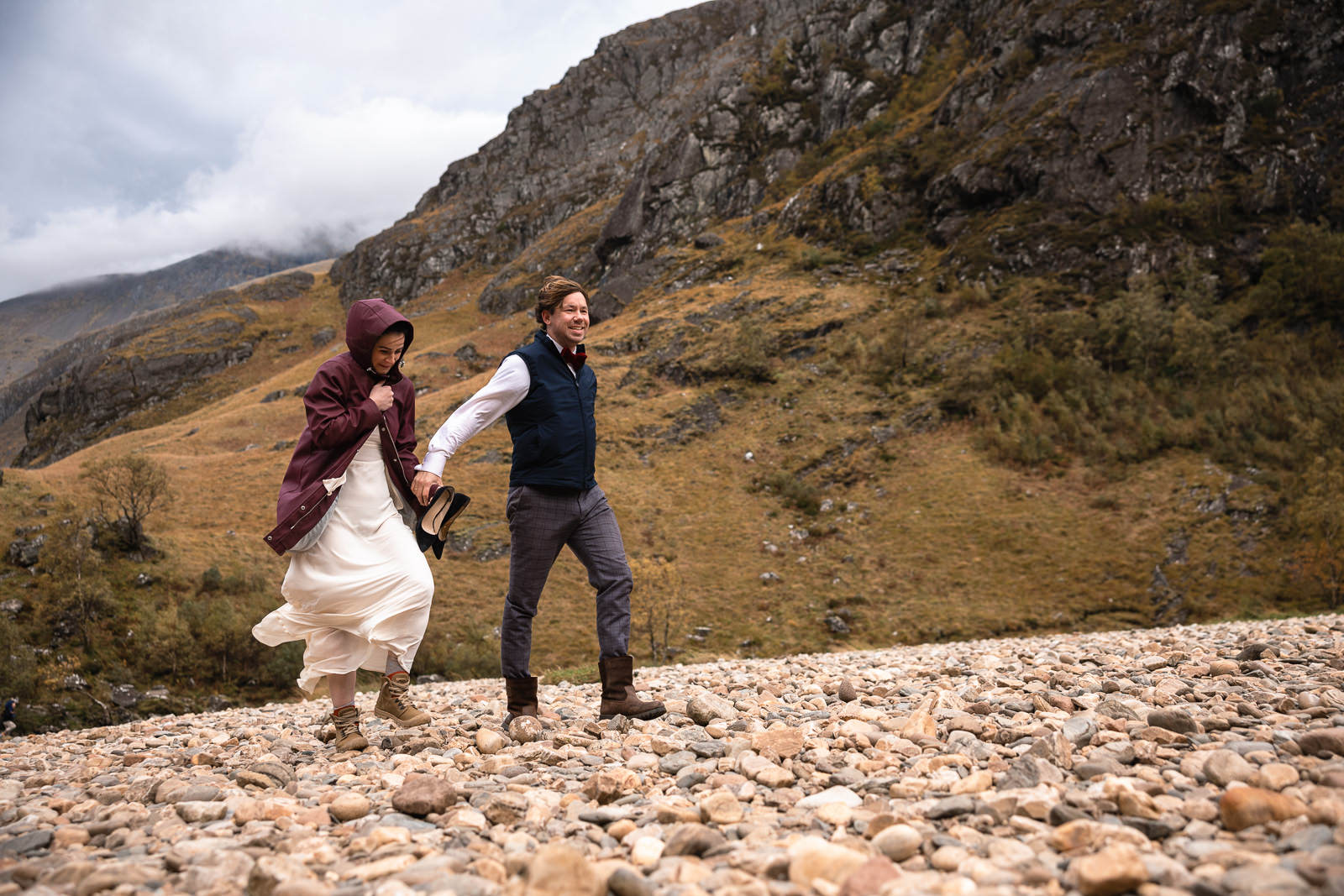 Eloping in Highlands Scotland with Wedding Photographer hiking couple