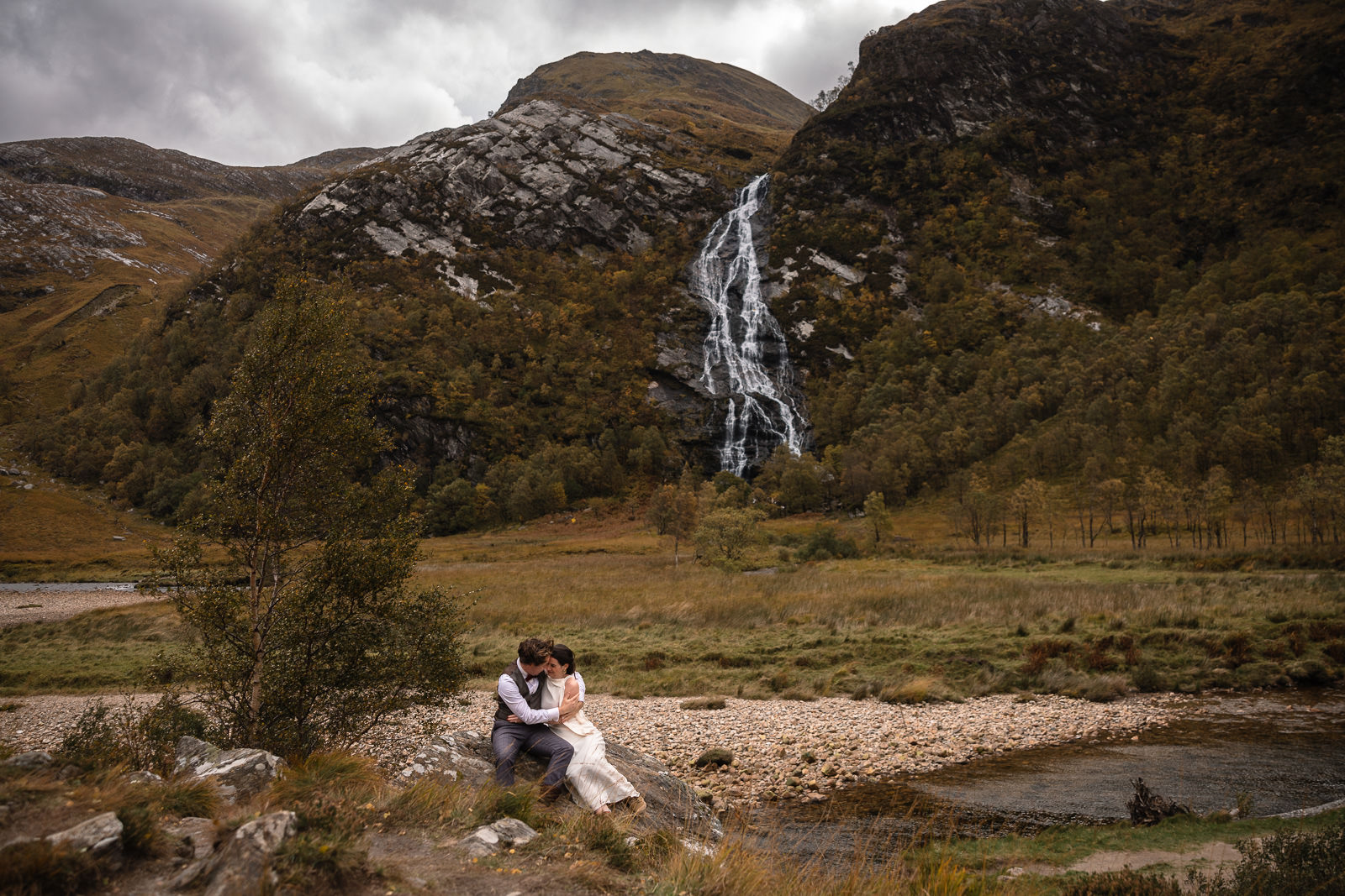 Eloping in Highlands Scotland by waterfall with Wedding Photographer