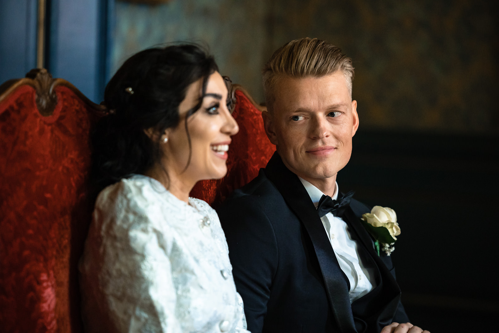 Groom looks in love at his bride Wedding photographer The Hague 