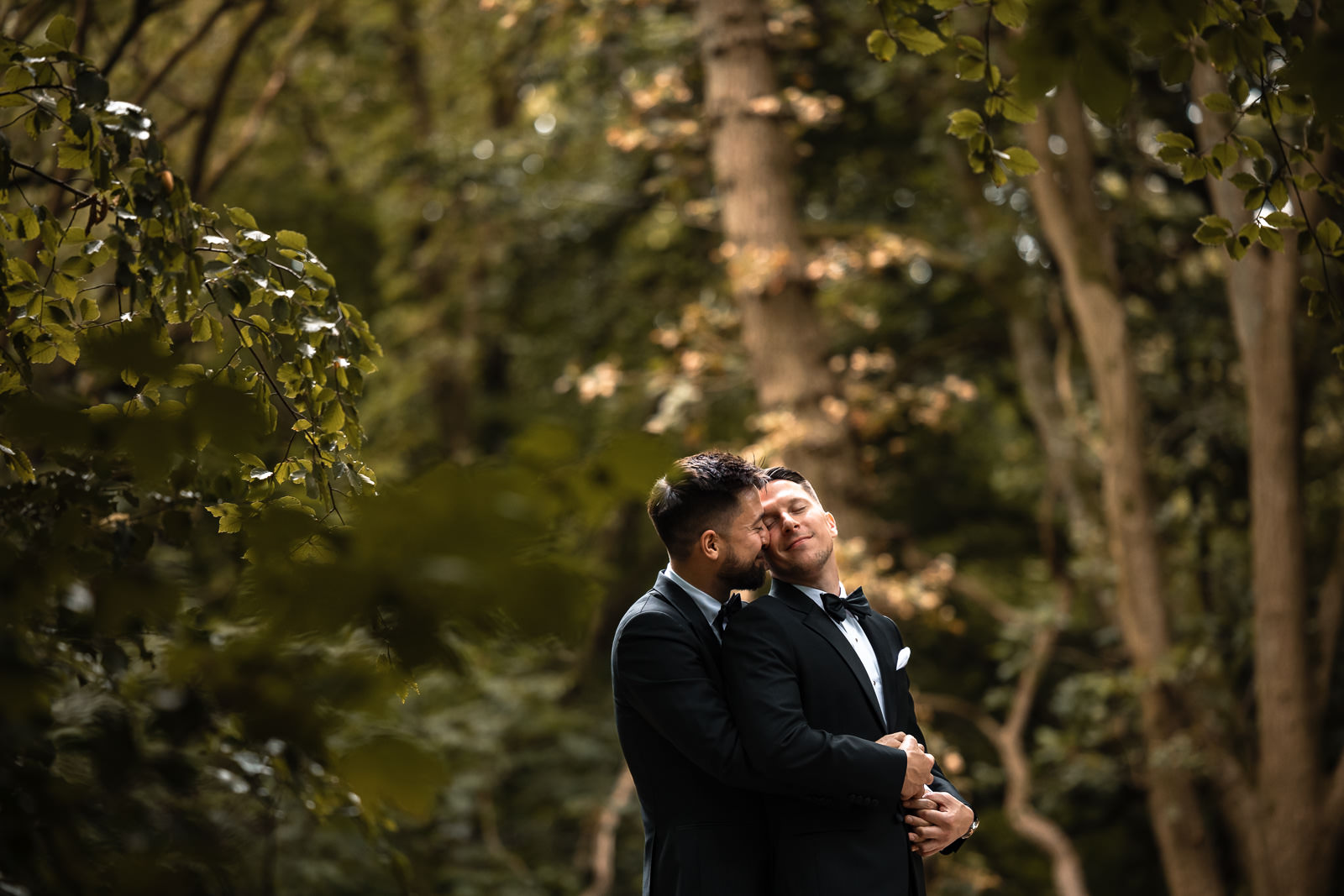 Intimate shot of the two grooms same sex wedding