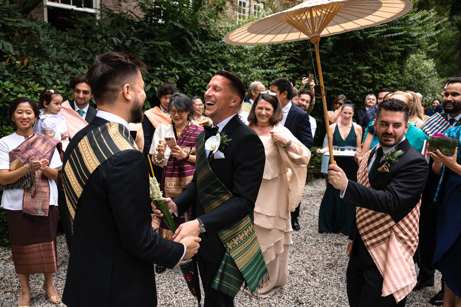 groom sees his partner during traditional Laos ceremony