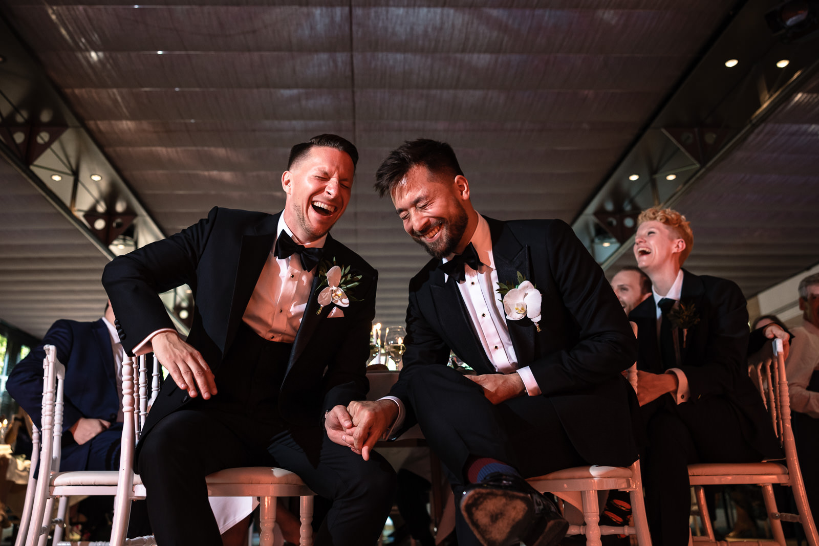 Laughter during dinner speeches same sex wedding